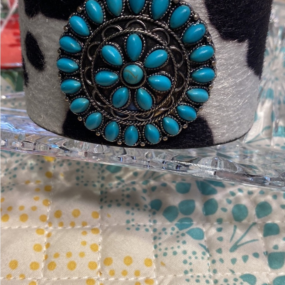 Turquoise cuff bracelet and earrings to match.